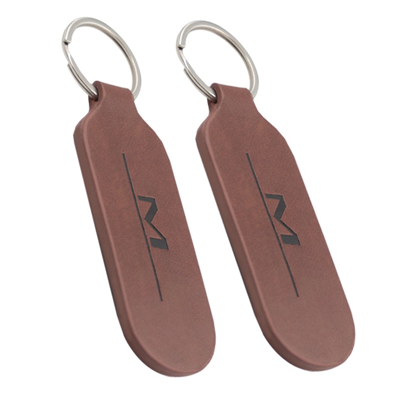 Schlüsselanhänger aus rotem Leder mit Laser-Logo